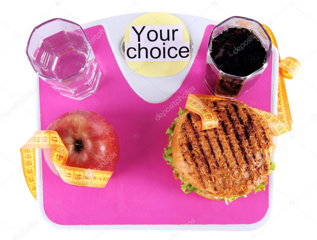 Burgers and fruit on the scale