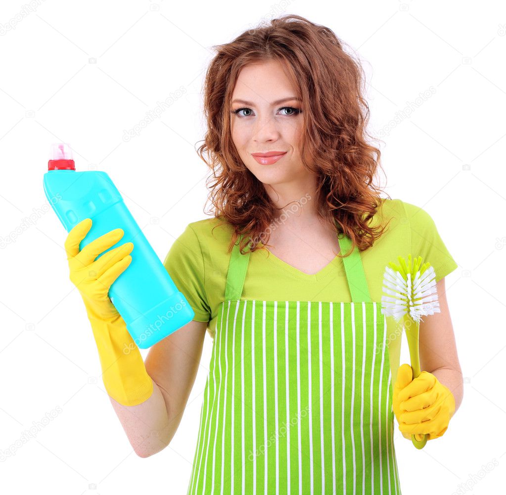 Young woman wearing rubber gloves with cleaning supplies, isolated on white