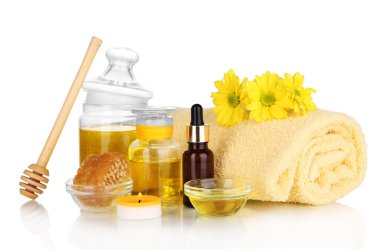 yağlar ve üzerinde beyaz izole bal kokulu bal spa