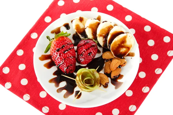 Fruit in chocolate on a red napkin polka dot — Stock Photo, Image