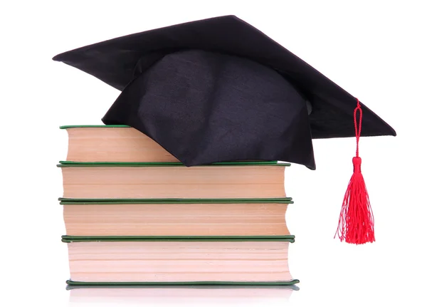 Chapéu de Grad com livros isolados em branco — Fotografia de Stock