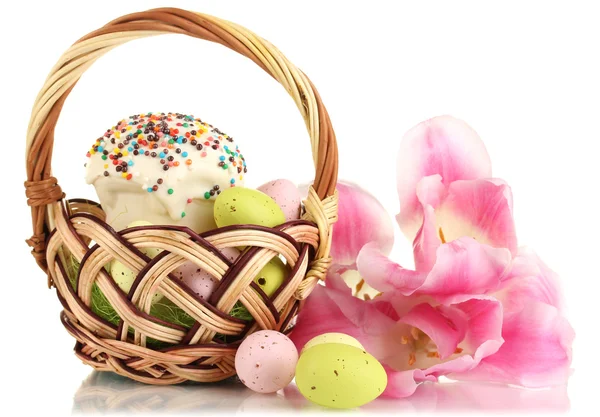 Easter cake with eggs in wicker basket isolated on white — Stock Photo, Image