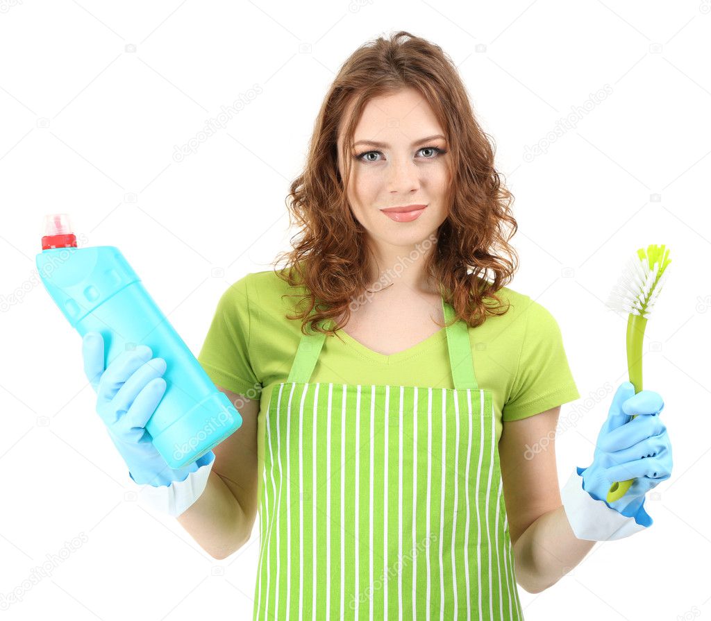 Woman wearing rubber gloves with cleaning supplies