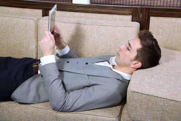 Businessman on sofa