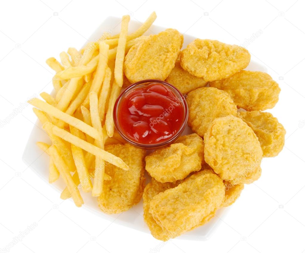 Fried chicken nuggets with french fries and sauce isolated on white