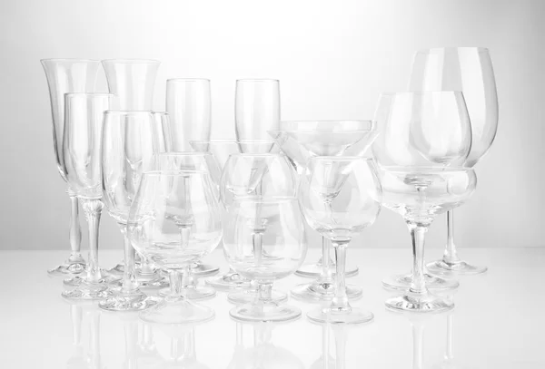 Cocktail and wine glasses, on gray background — Stock Photo, Image