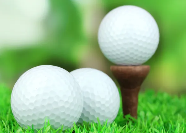 Golf balls on grass outdoor close up — Stock Photo, Image