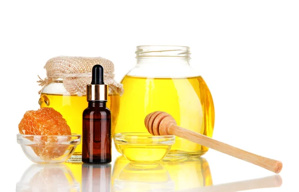 Spa de miel fragante con aceites y miel aislada en blanco —  Fotos de Stock