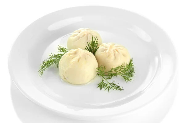 Tasty khinkali on plate, isolated on white — Stock Photo, Image