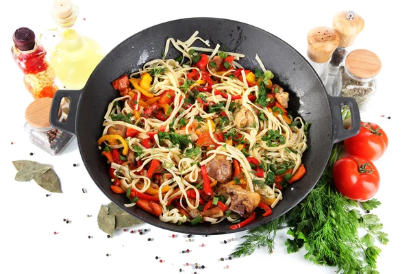 Noodles with vegetables on wok isolated on white — Stock Photo, Image