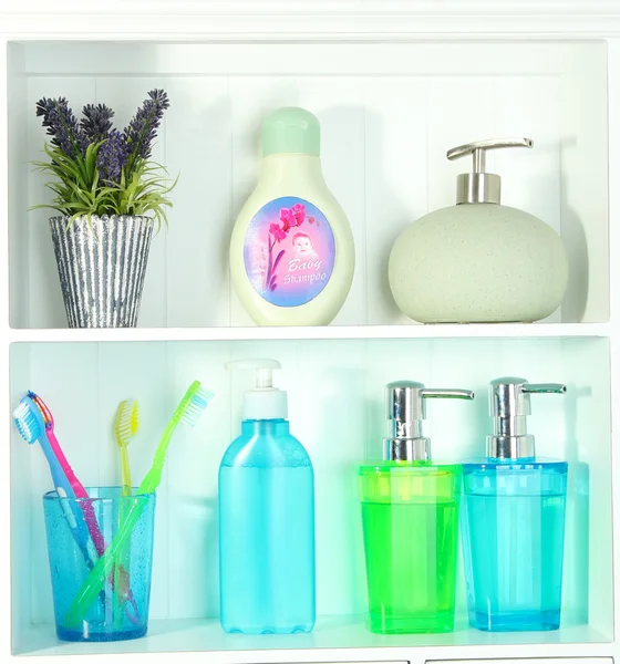 Beautiful white shelves with different bathroom objects — Stockfoto