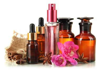 Bottles with ingredients for the perfume, isolated on white clipart