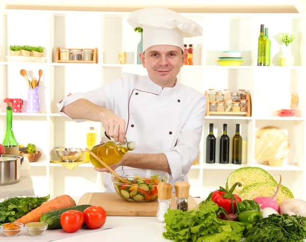 Chef cooking in kitchen — Stock Photo, Image