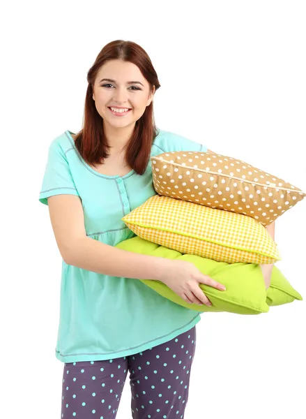 Beautiful young girl with pillows isolated on whit — Stock Photo, Image