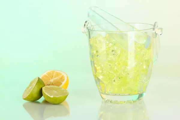 Ice in the bucket on different backgrounds — Stock Photo, Image