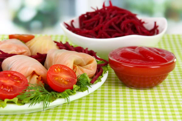 Stuffed cabbage rolls on table in room — Stock Photo, Image