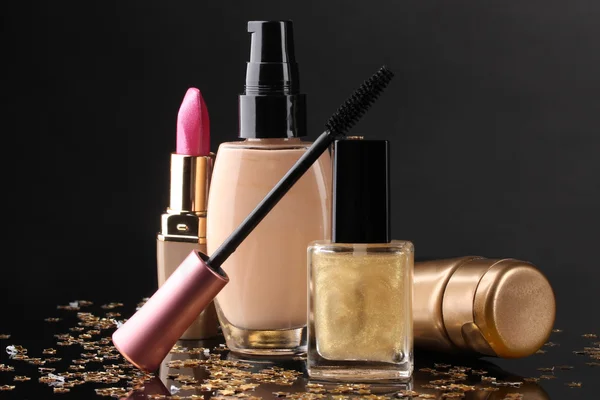 Cosmetics isolated on black — Stock Photo, Image