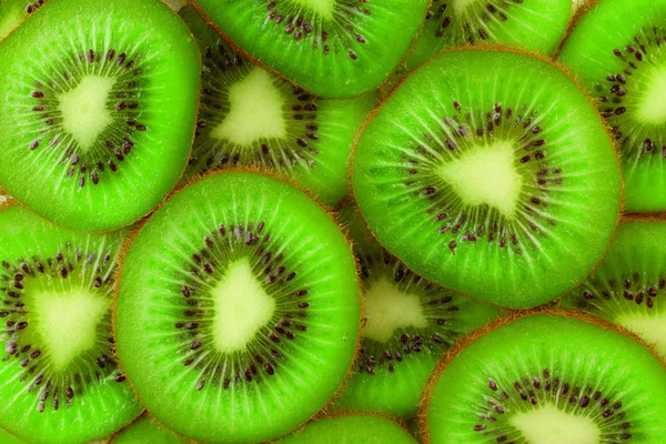 Fette di kiwi come sfondo — Foto Stock