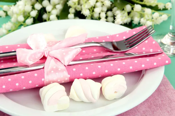 Table setting in white and pink tones on color wooden background — Stock Photo, Image