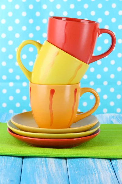 Three cups on bright background — Stock Photo, Image