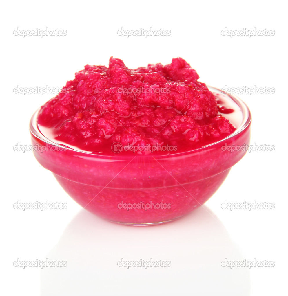 Horseradish sauce with beet in glass bowl, isolated on white