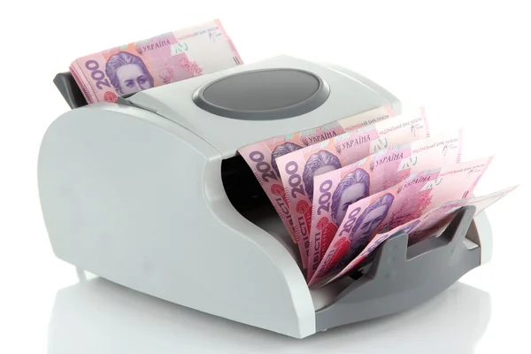 Beyaz izole Ukraynalı para ile para sayma makinesi — Stok fotoğraf