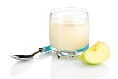 Delicious yogurt in glass with apple isolated on white clipart