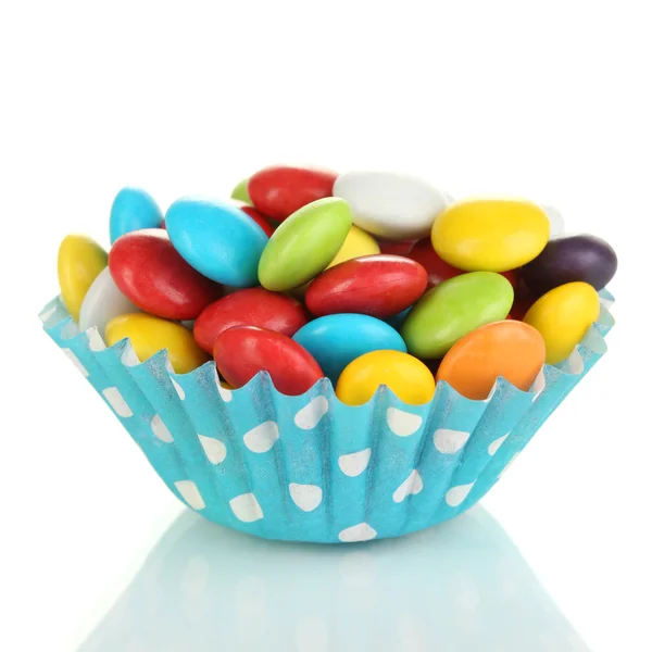 Colorful candies in cupcake case isolated on white — Stock Photo, Image