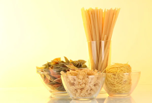 Different types of pasta on light background — Stock Photo, Image
