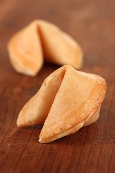 Fortune cookies on wooden table — Stock Photo, Image