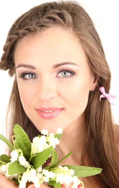 Jonge vrouw met mooi kapsel en bloemen, geïsoleerd op wit — Stockfoto