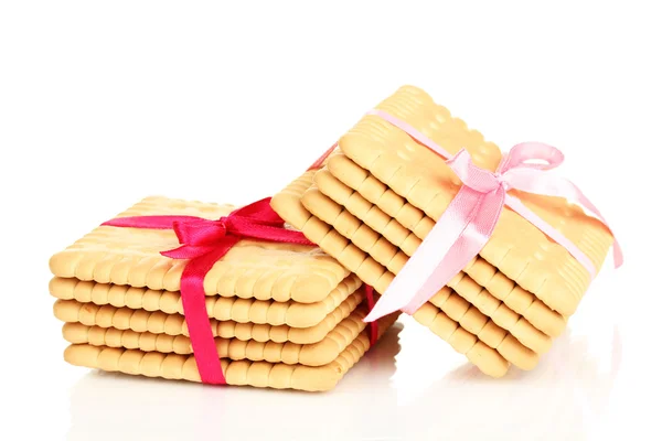 Sweet cookies tied with pink ribbons isolated on white — Stock Photo, Image