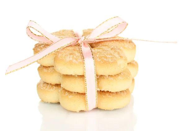 Sladké sušenky s růžovou stuhou izolovaných na bílém — Stock fotografie