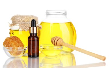 yağlar ve üzerinde beyaz izole bal kokulu bal spa