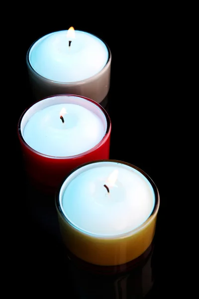 Свечи, изолированные на черном — стоковое фото