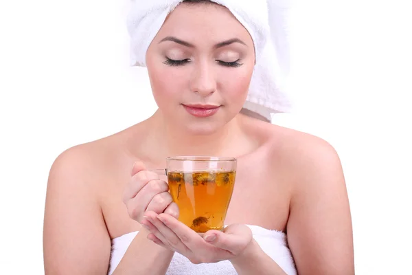 Beautiful young woman with cup of herbal tea isolated on white — Stock Photo, Image