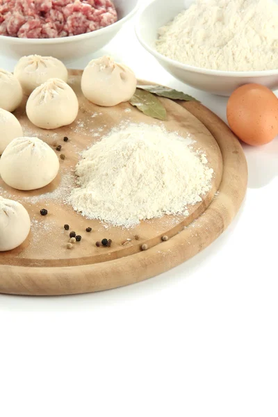 Raw Georgian khinkali on wooden desk and ingredients, isolated on white — Stock Photo, Image