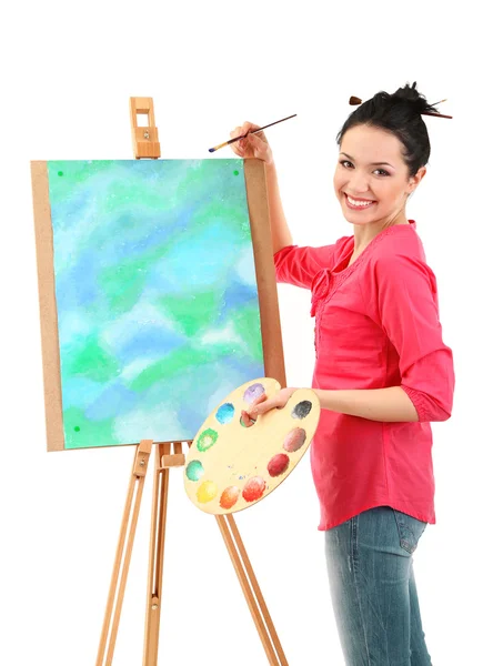 Beautiful young woman painter at work, isolated on white — Stock Photo, Image