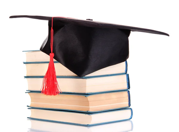 Chapéu de Grad com livros isolados em branco — Fotografia de Stock