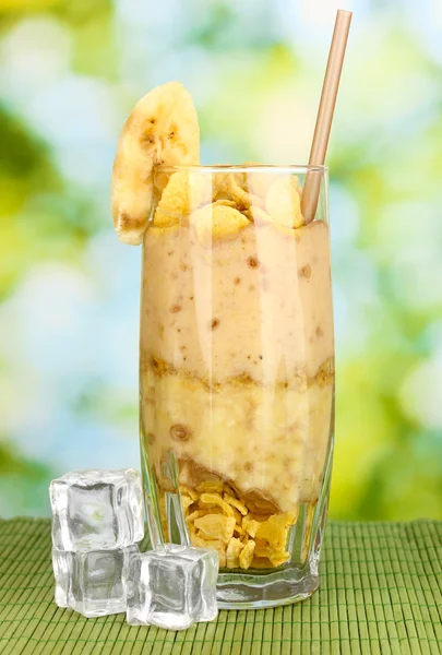 Delicious fruit smoothie on bright background — Stock Photo, Image