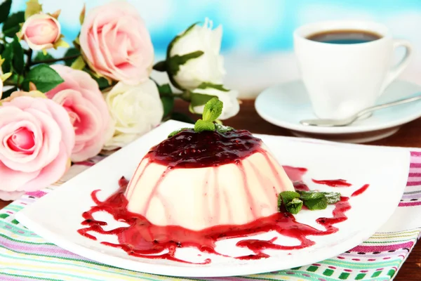 Panna Cotta with raspberry sauce, on bright background — Stock Photo, Image