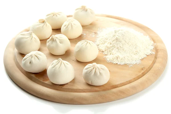 Raw khinkali on wooden desk, isolated on white — Zdjęcie stockowe