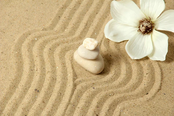 Zen garden with raked sand and round stones close up — Stock Photo, Image