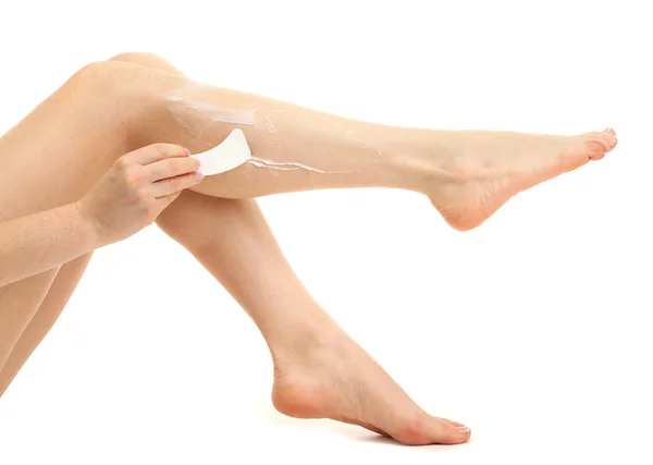 Gyönyörű nő lába szőrtelenítés krém, elszigetelt fehér — Stock Fotó