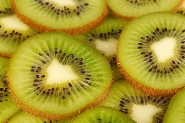 Kiwi segmenten achtergrond — Stockfoto