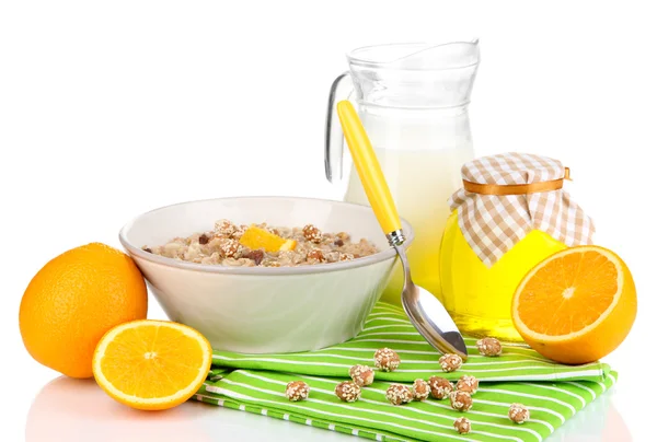 Useful oatmeal in bowl with fruit isolated on white — Stock Photo, Image