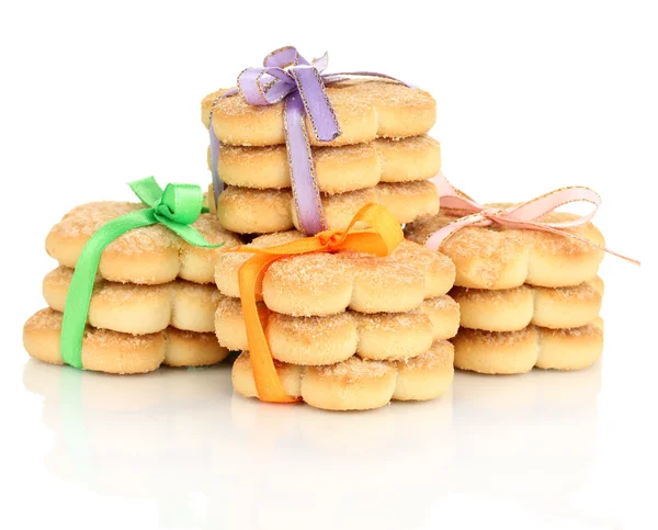 Biscoitos doces amarrados com fitas coloridas isoladas em branco — Fotografia de Stock