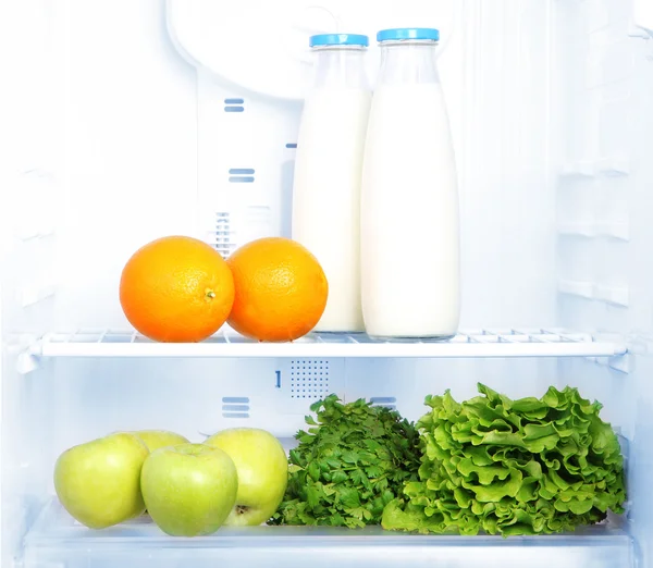 Open refrigerator with vegetarian food — Stock Photo, Image