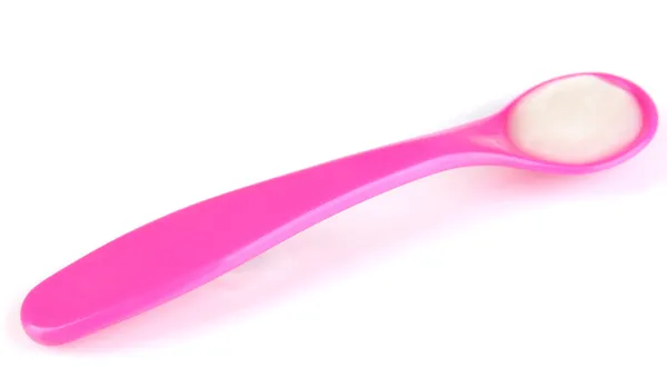 Pink spoon for baby food isolated on white — Stock Photo, Image