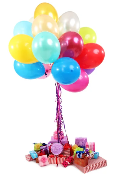 Many bright balloons and many gifts isolated on white — Stock Photo, Image
